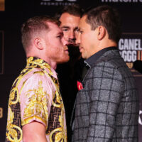 June 27, 2022; New York, NY; Saul "Canelo" Alvarez and Gennadiy "GGG" Golovkin face-off during the NY press conference at Tao prior to their fight to be held at T-Mobile Arena on September 17th in Las Vegas, NV. Mandatory Credit: Ed Mullholland/Matchroom.