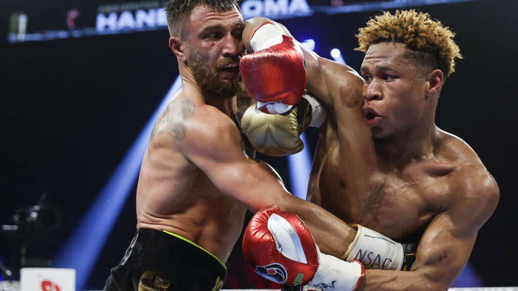LAS VEGAS, NEVADA - MAY 20: Devin Haney punches Vasyl Lomachenko of Ukraine during their undisputed lightweight title bout at MGM Grand Garden Arena on May 20, 2023 in Las Vegas, Nevada. (Photo by Sarah Stier/Getty Images)